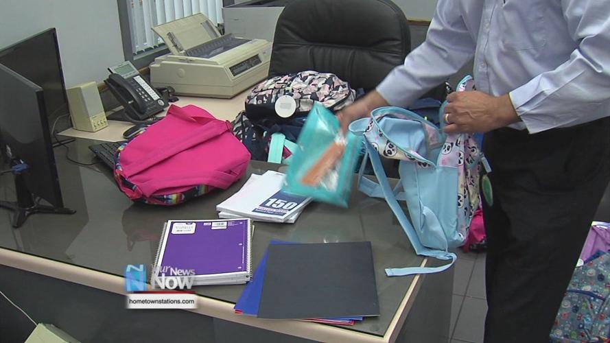Lima businesses partner for backpack giveaway 1.jpg