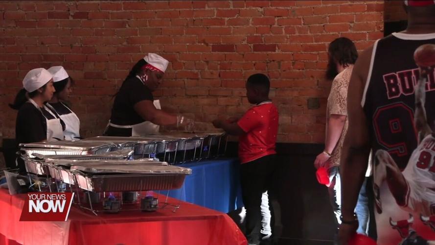 Lima residents taste test culture at celebration of Haitian Flag Day