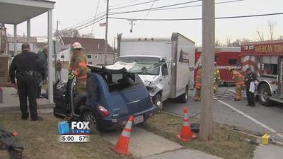 Two Car Accident Ends in Front of House off Main Street in Elida
