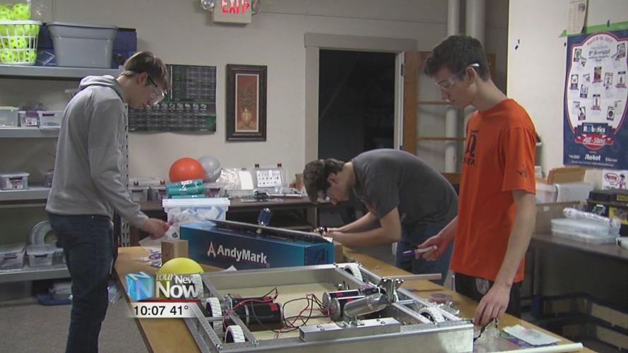 PPG Coatings Services donates $5000 to Lima YMCA's robotic team