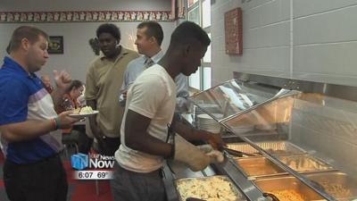 Students serving up breakfast and lunch at Spartan Inn