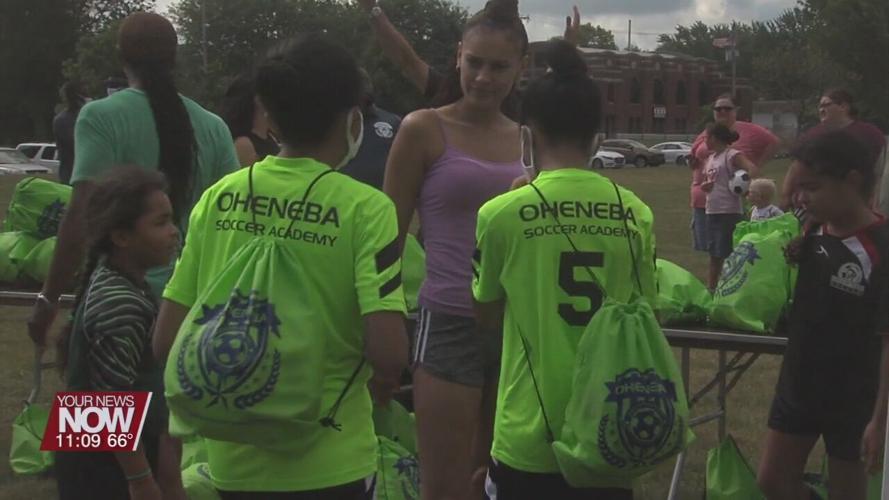 Local non-profit athletic organization gives away 200 soccer balls