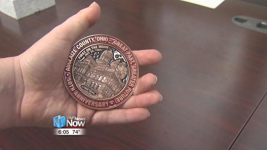 Auglaize  County Commissioners unveil 50th Anniversary medallion.jpg