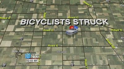 Two bicyclists injured after being struck by car