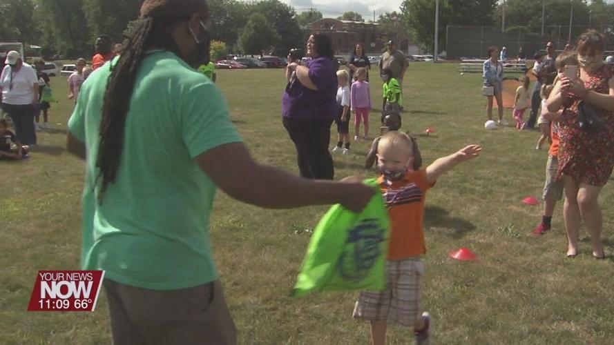 Local non-profit athletic organization gives away 200 soccer balls