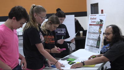 Elida Middle School students learn about financial literacy with Real Money, Real World
