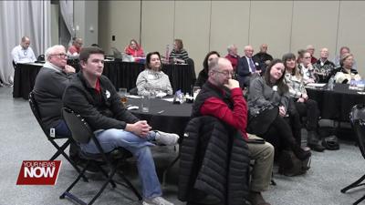 Lima Rotary hearing about Heir Force Community School updates