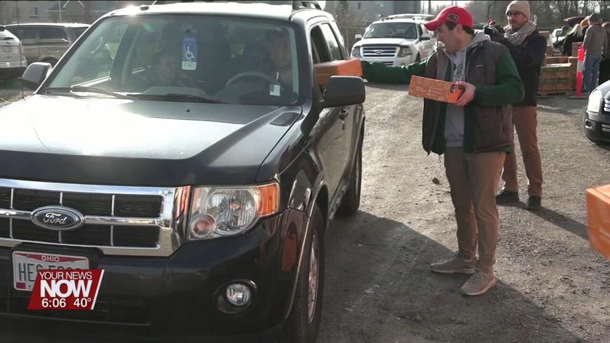 COSI make visit to Lima and hands out hundreds of free STEM Learning Lunch Boxes at a West Ohio Food Bank Distribution