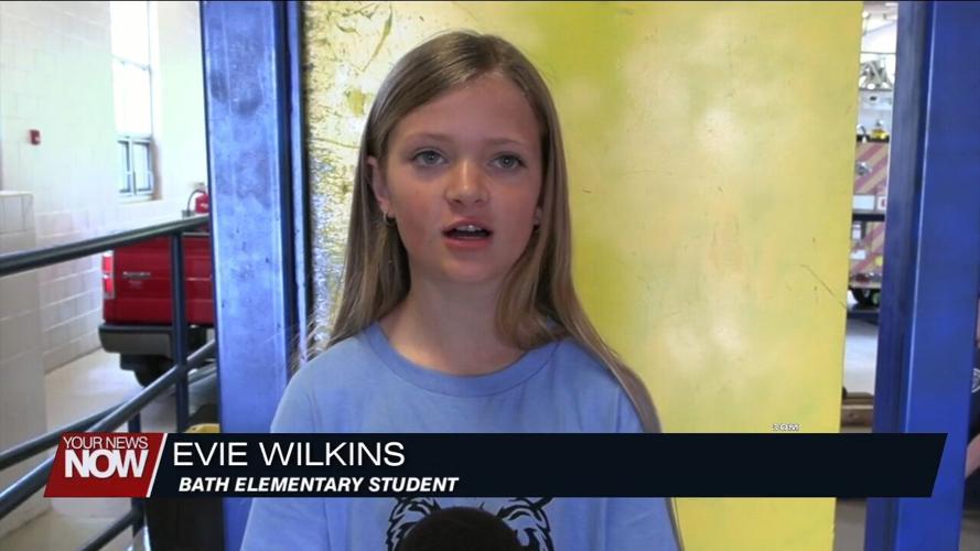 Bath Elementary 5th graders celebrate the completion of their D.A.R.E. program with Bath Township firefighters