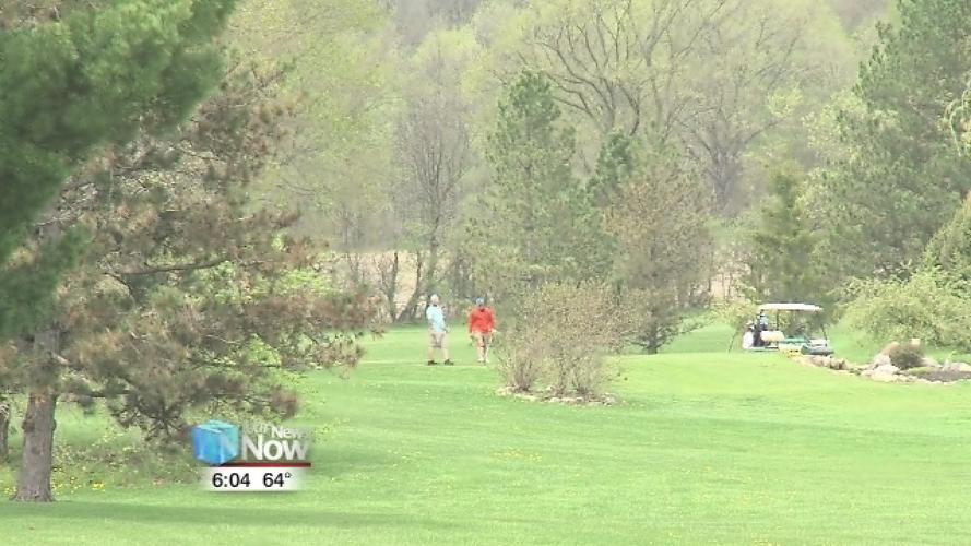 Weather holding up golf play 1.jpg