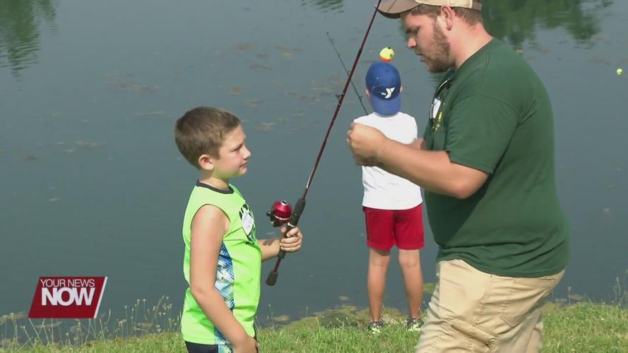 Local youth able to reelin experience during a fishing demonstration