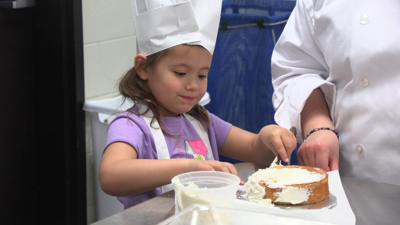 Young students celebrate Mother’s Day with cake decorating at Apollo Career Center