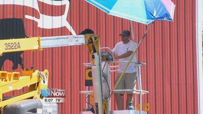 The Barn Artist finishing up new bicentennial logo at Allen County Farm Park