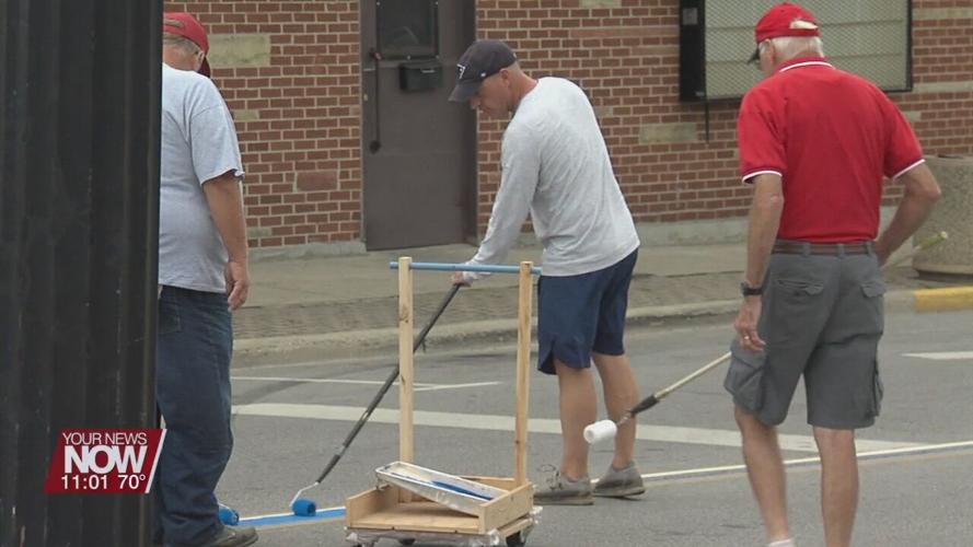 Wapakoneta Breakfast Optimist Club paints blue line to honor law enforcement