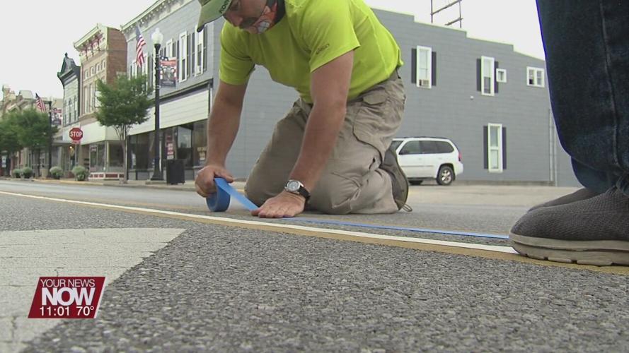 Wapakoneta Breakfast Optimist Club paints blue line to honor law enforcement