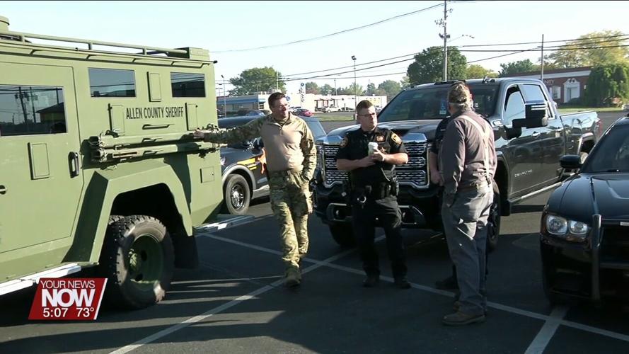 Law enforcement from Allen County meets community members for National Coffee with a Cop Day