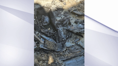 Wooden coffin with human remains unearthed in Downtown Lima