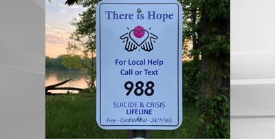 988 Crisis Helpline Sign