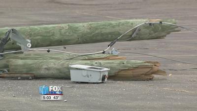Semi trailer takes down 3 power poles in Century Lanes parking lot