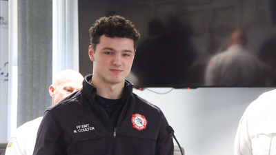 Second generation Lima firefighter completes probation, receives badge and shield