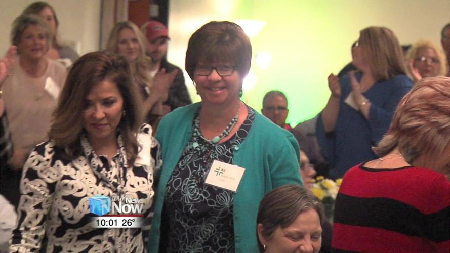 Lima Memorial give High Fives to employees for longevity 2.jpg