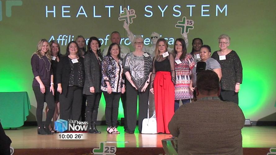 Lima Memorial give High Fives to employees for longevity 1.jpg