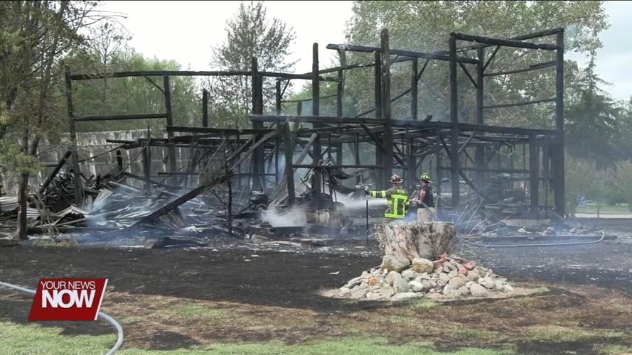 Multiple departments called in to battle a 3-alarm barn fire on Grubb Road South