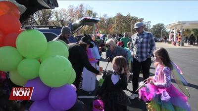 Trick or treaters stop by Chiles-Laman Funeral Home for trunk or treat