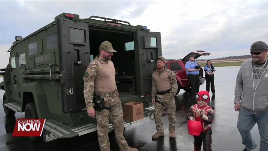 Families get to experience spooky fun and airplanes during Trick-or-Treat at the Scareport event