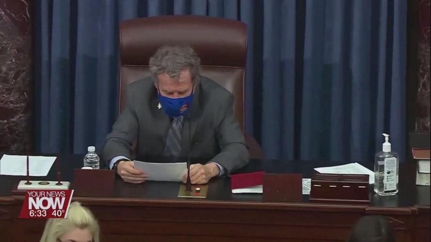 Sen. Brown celebrates the passage of The Butch Lewis Act