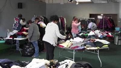 Community groups join forces for monthly clothing giveaway in Lima