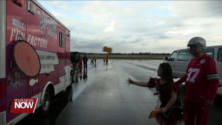 Families get to experience spooky fun and airplanes during Trick-or-Treat at the Scareport event