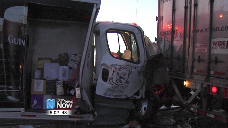 A delivery truck driver strikes two parked semis on an I-75 off-ramp 1.jpg