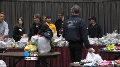 Residents Give Thanks for Clothes and Groceries