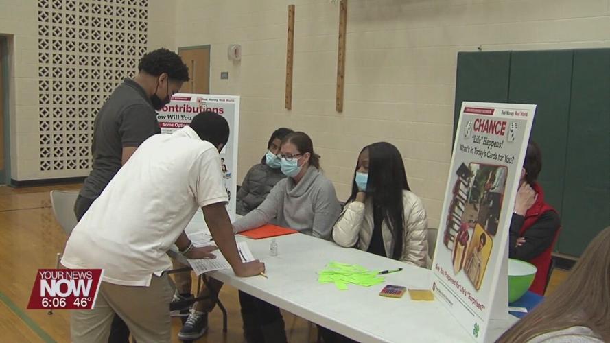 Lima Senior DECA students teaching West Middle School students about financial literacy