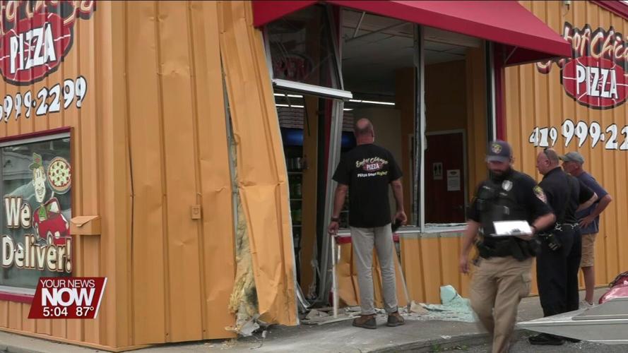 Car crashes into East of Chicago on Elm Street