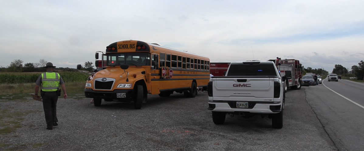 Law enforcement investigates hit-and-run accident involving a Perry school bus