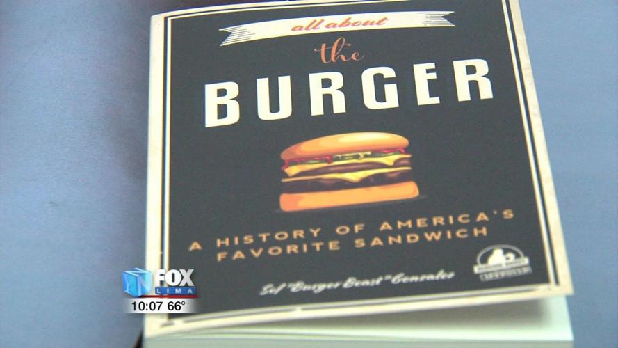 Burger Beast signs copies of his book at Kewpee 2.jpg