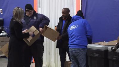 Ford and Reineke employees volunteer at West Ohio Food Bank