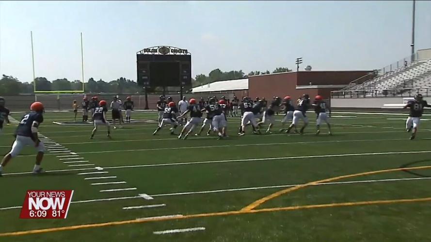 Stay hydrated while playing sports in the heat is important to young athletes