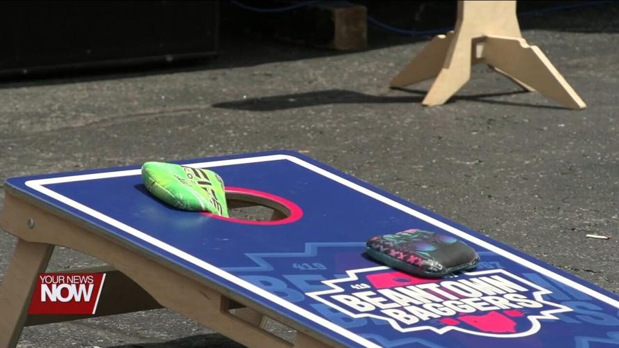 Festival Goers Participate in Cornhole Tournament on Day 2 of the St. Gerard Festival