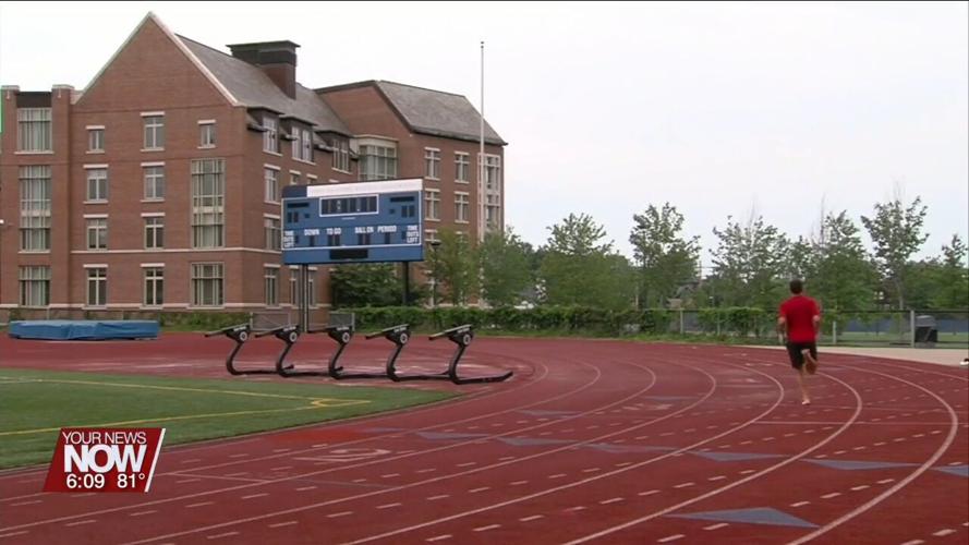Stay hydrated while playing sports in the heat is important to young athletes