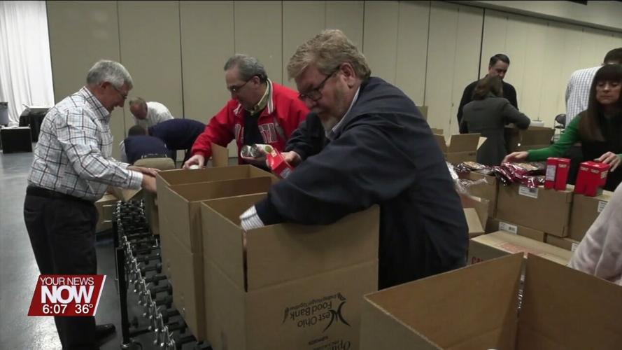 Lima Rotary members help West Ohio Food Bank pack food boxes for seniors