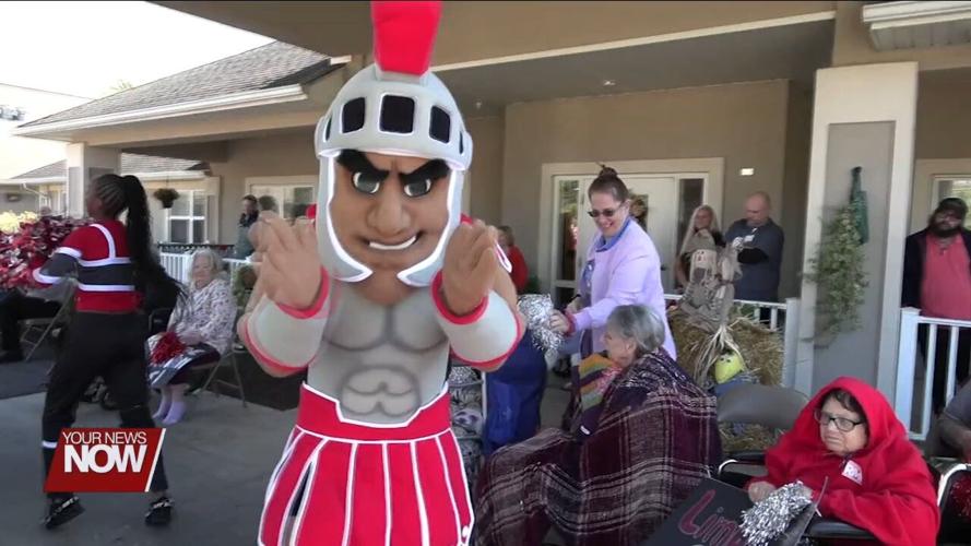 Springview Manor residents and staff cheer on Lima Senior Spartans with a pep rally