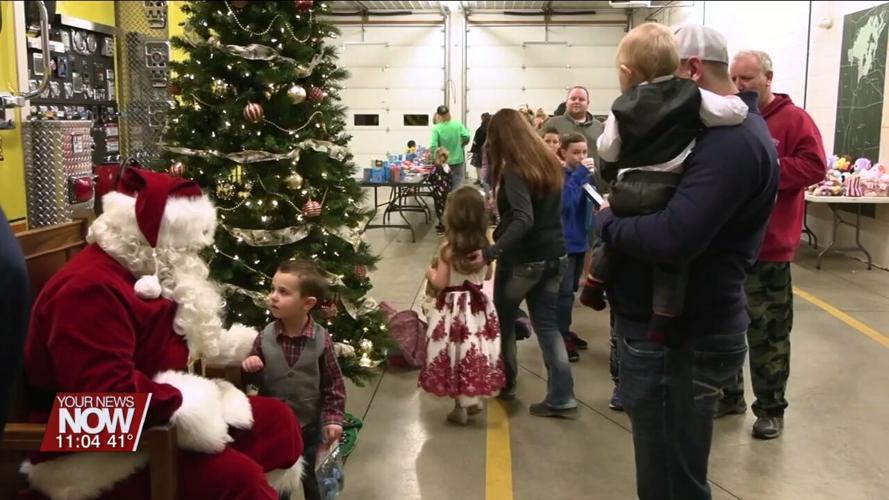 Kids of Russells Point see Santa ride through their neighborhoods