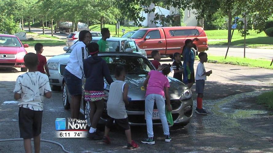 Kids at Bradfield Community Center wash some cars for a fundraiser 2.jpg