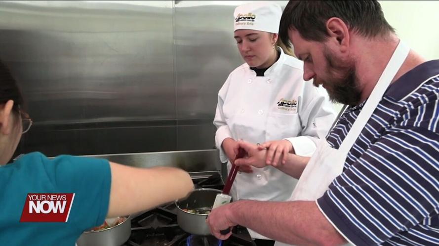 FANS from Allen County Board of DD learn how to make pot pies thanks to Apollo culinary students