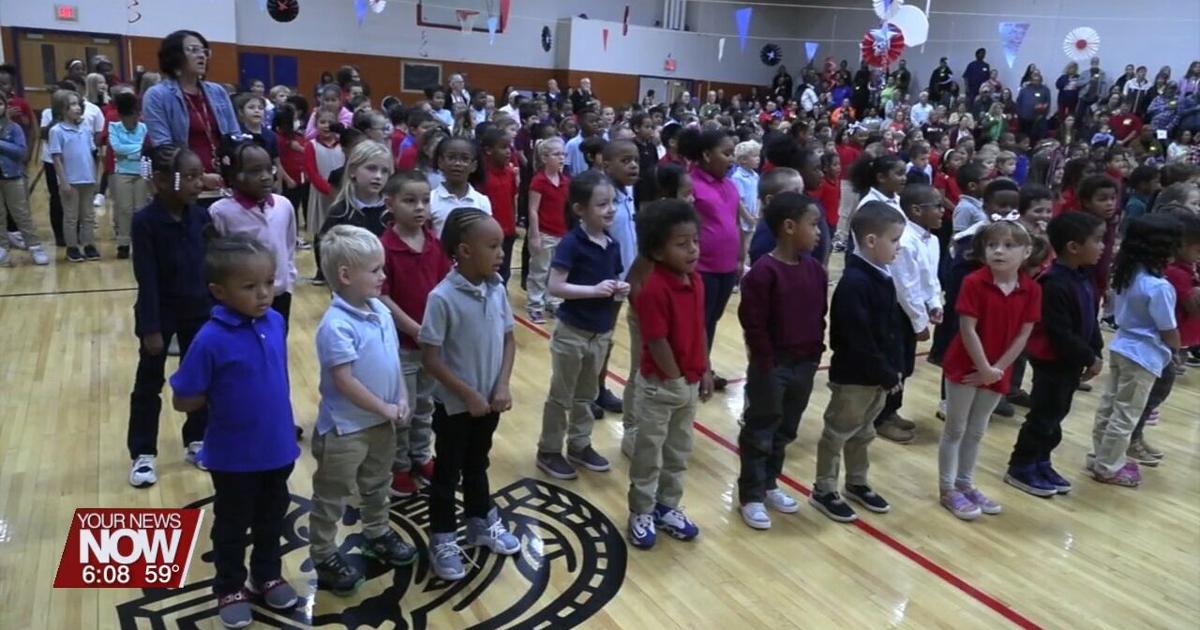 Heritage Elementary students learn about military service during