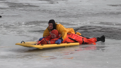 Lima Firefighters practice ice rescue techniques on Schoonover Lake