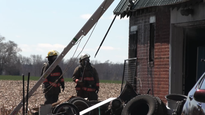 Fire crews contain fully engulfed barn fire in Gomer
